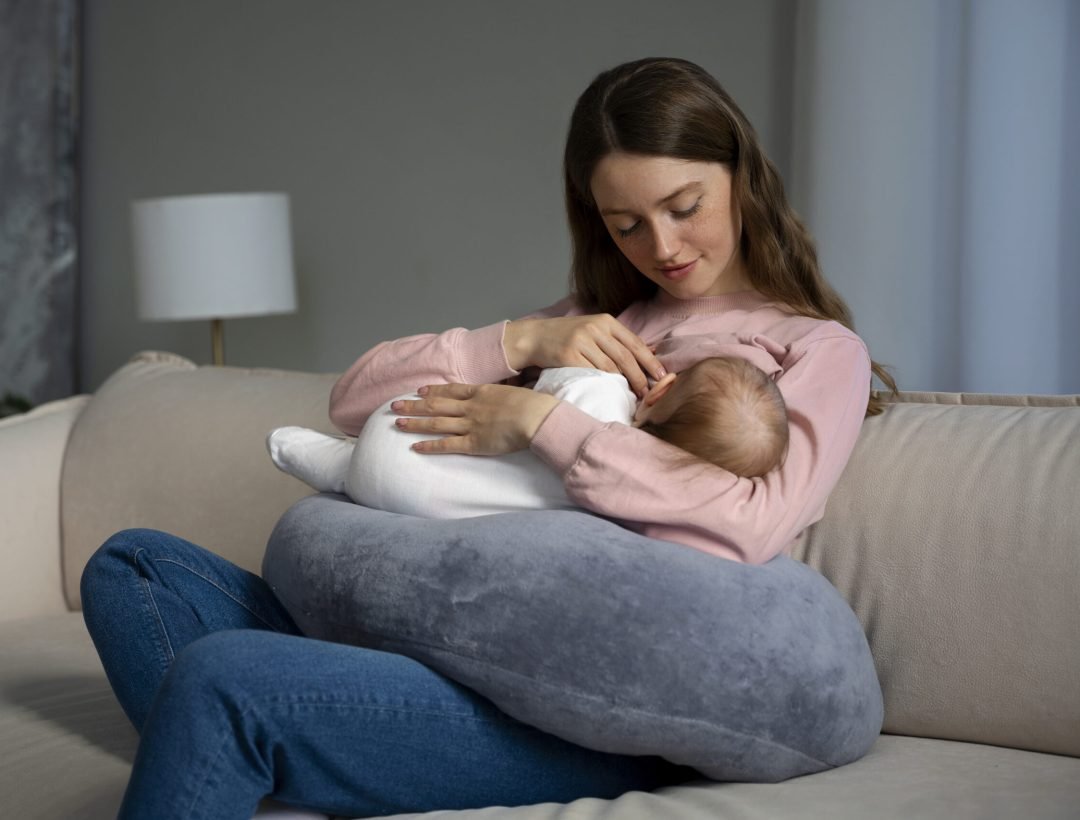 side-view-mother-with-cute-newborn